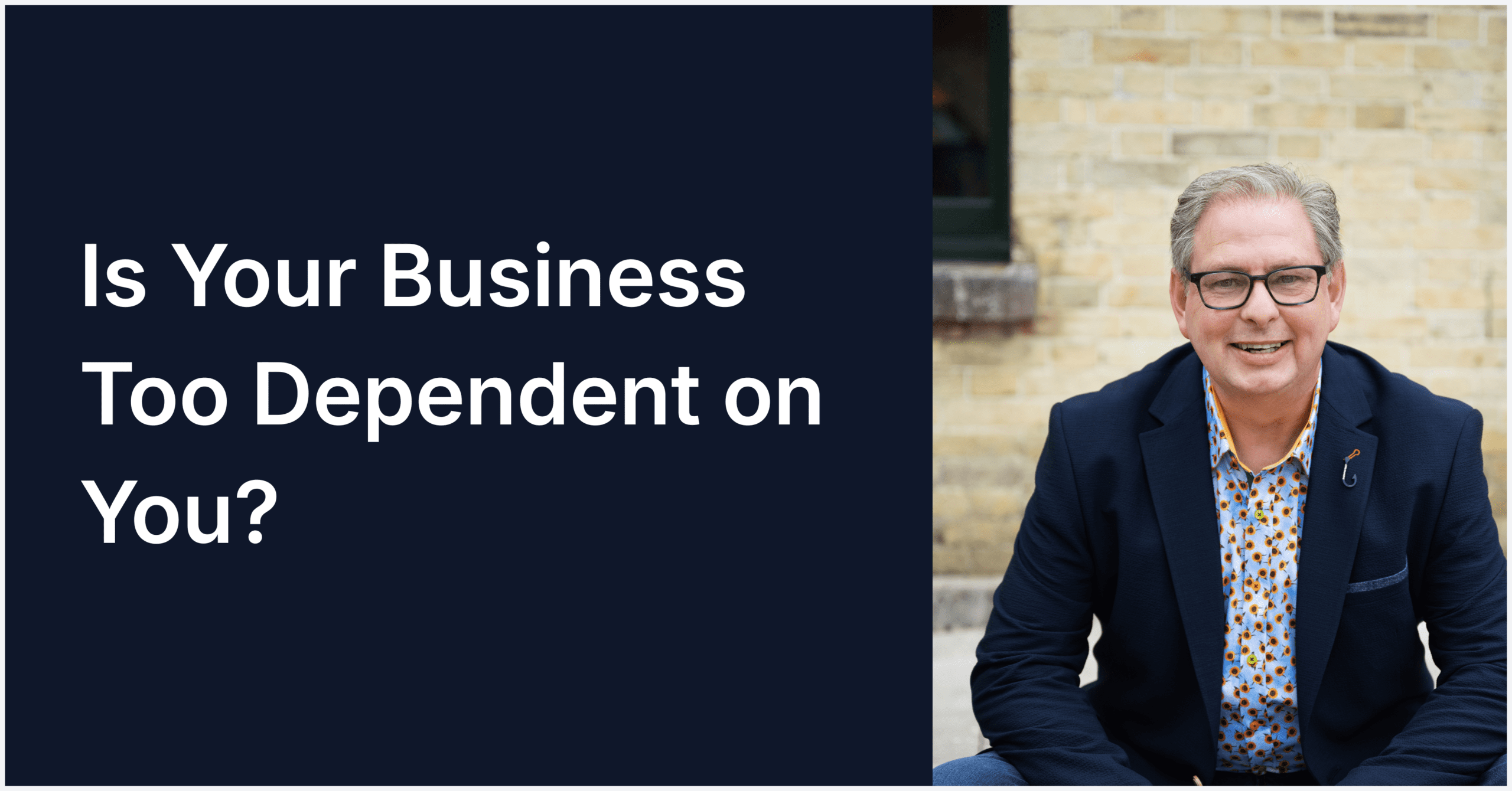 Business dependency question with smiling man.